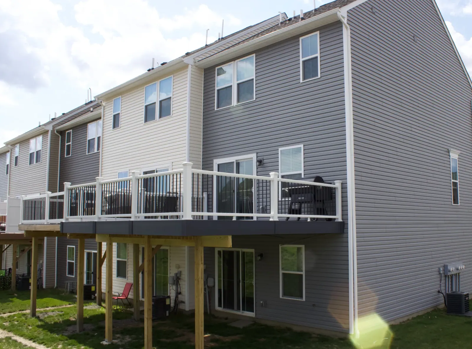 Cable railing deck built by Oasis Custom Decks