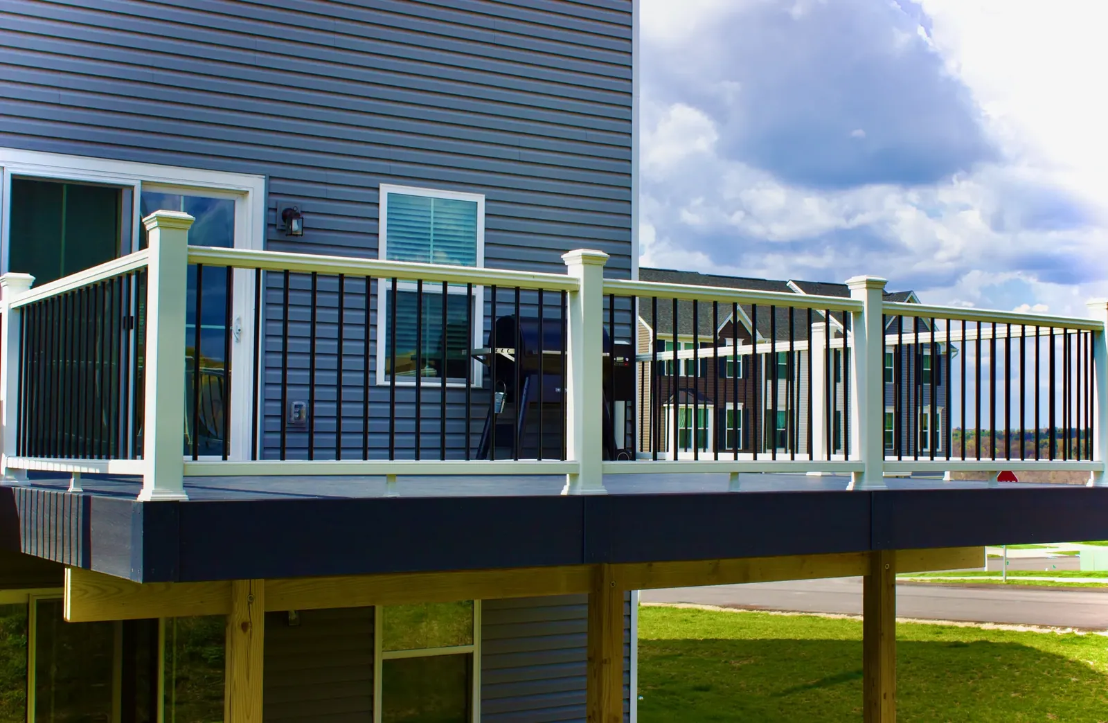 Cable railing deck built by Oasis Custom Decks