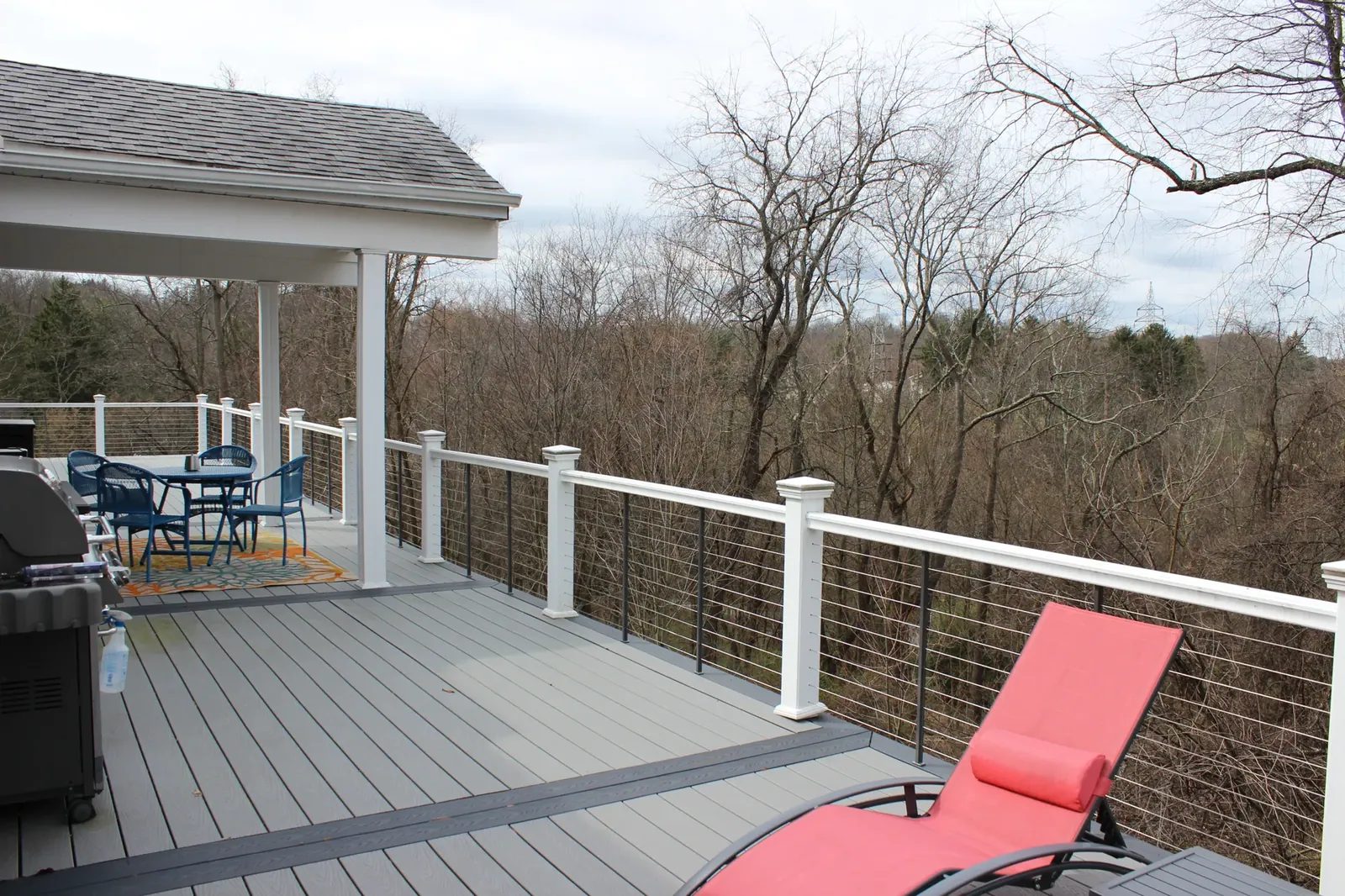 Elevated deck & stairs built by Oasis Custom Decks