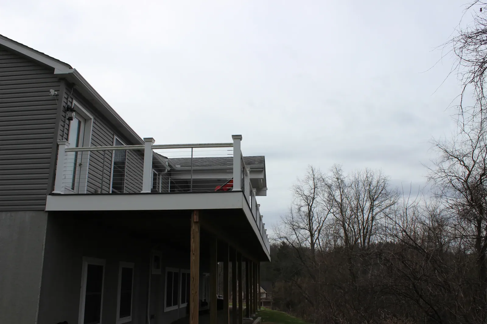 Elevated deck & stairs built by Oasis Custom Decks