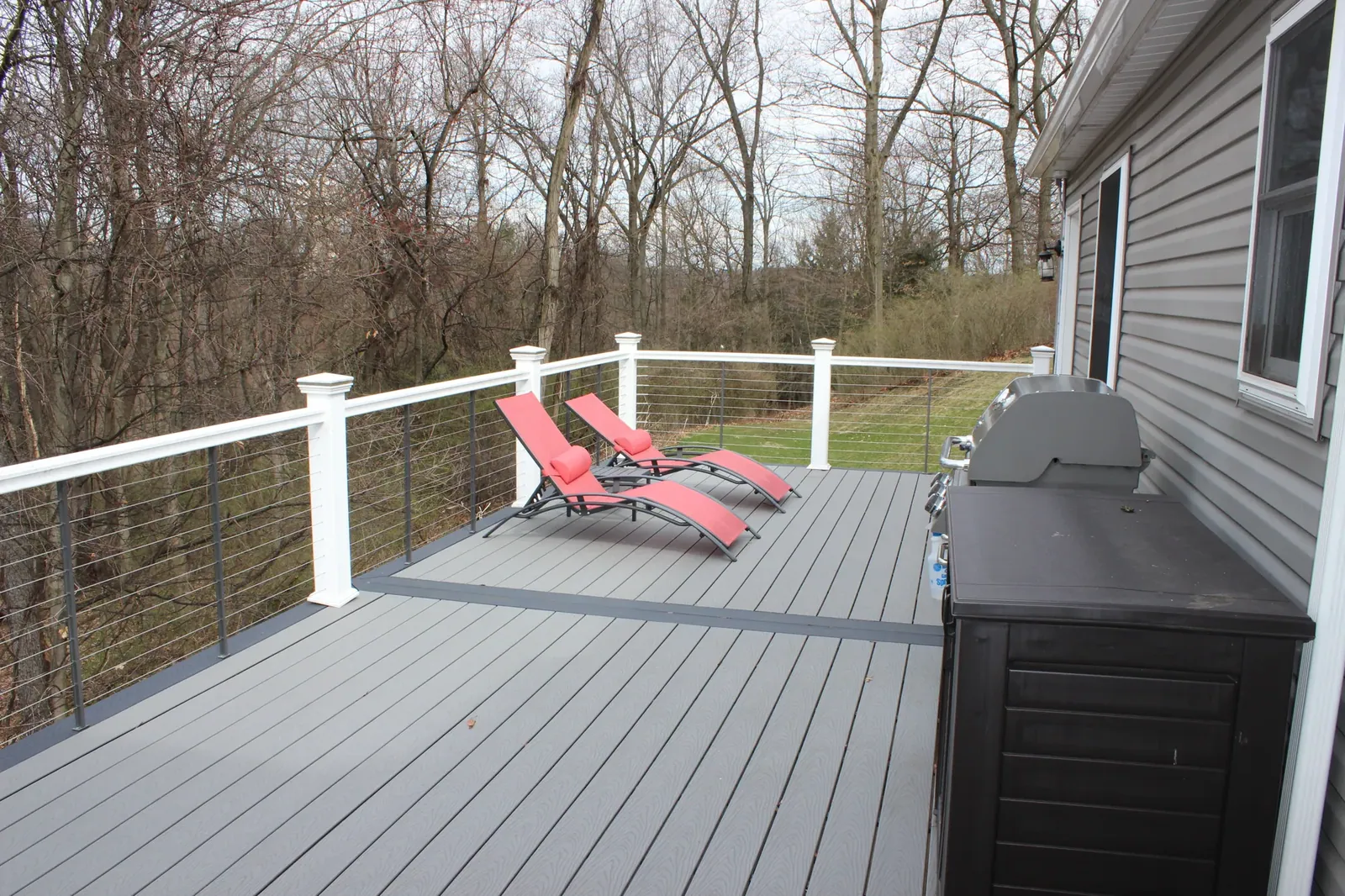 Elevated deck & stairs built by Oasis Custom Decks