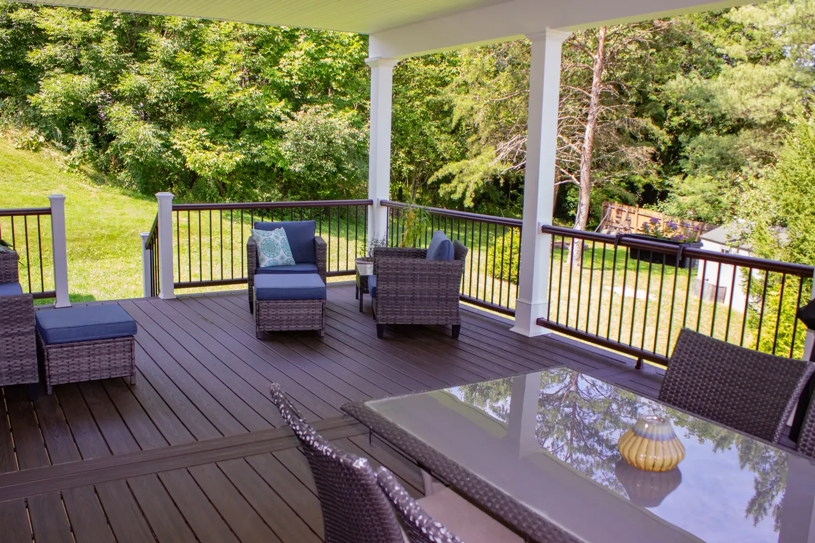 Covered deck & hot tub built by Oasis Custom Decks